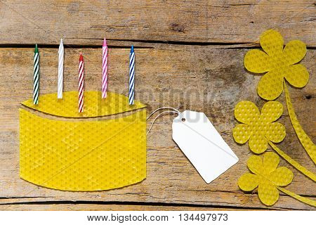 Beeswax, Cake With Candles And Flowers On Wooden Table, Empty Sign