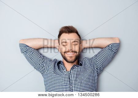 Handsome Relaxed Man With Closed Eyes Resting After Long Day
