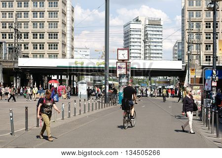 BERLIN, GERMANY - MAY 10: The busy and famous Alexander place with pedestrians and passersby in fine weather on May 10, 2016 in Berlin.