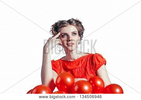 She thought and looking for solutions on a white background. The red dress with red balls.