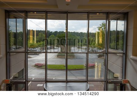 Exit glass door showing a beautiful canvas