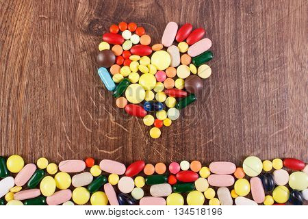 Heart Shaped Colorful Medical Pills And Capsules, Health Care Concept