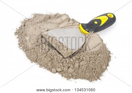 Gray cement powder with trowel