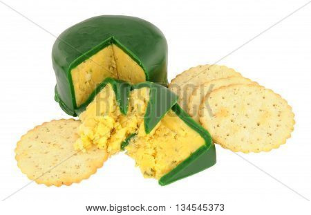 Green wax covered double Gloucester cheese isolated on a white background