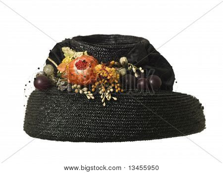 Frau Hut mit Blumen