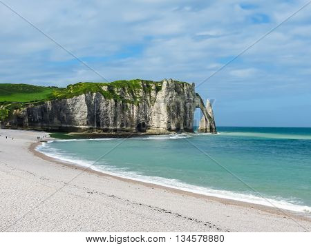 Cote d'Albatre or Alabaster Coast is part of the French coast of the English Channel. Famous cliff Porte d'Aval. Etretat France
