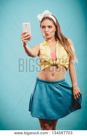 Retro Girl With Smartphone Taking Selfie