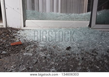 Glass from a shattered sliding glass door a home invader broke