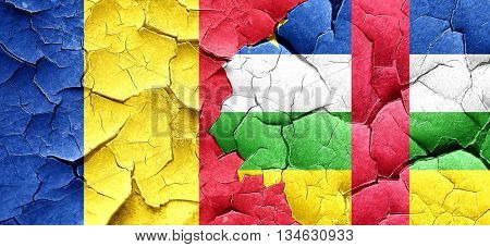 Romania flag with Central African Republic flag on a grunge crac