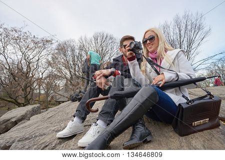 NEW YORK - CIRCA MARCH, 2016: outdoor lifestyle portrait of young people in Central Park. Central Park is an urban park in middle-upper Manhattan, within New York City.