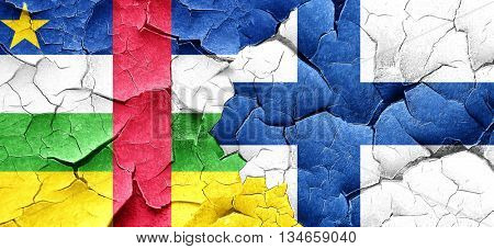 Central african republic flag with Finland flag on a grunge crac