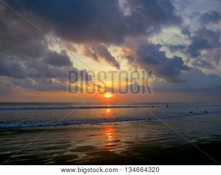 Beautiful sunset sky with reflection at Kuta and Seminyak beach, Bali