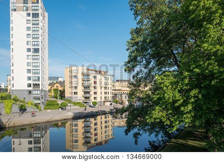 LINKOPING, SWEDEN - JUNE 3, 2016: Summer morning by river Stangan in Linkoping. Linkoping is a famous University town in Sweden.