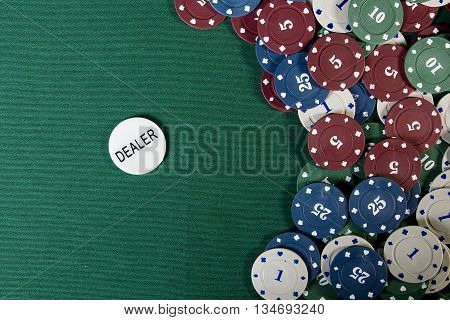 Casino gambling chips with copy space on the green cloth