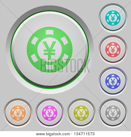 Set of color Yen casino chip sunk push buttons.