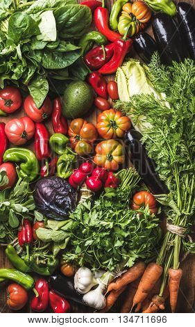 Variety of resh raw vegetable ingredients for healthy cooking or salad making, top view. Diet or vegetarian food concept, horizontal composition