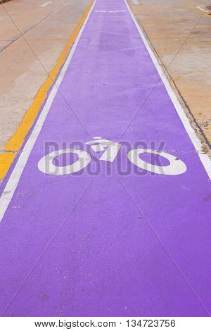 the sign bicycle on purple bicycle lane