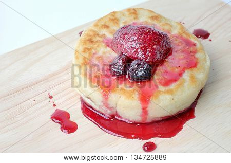 English Crumpets & Berry Topping On Wood Board Isolate On White Background