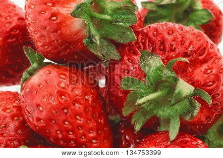 Fresh strawberries piled high ready to eat