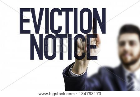 Business man pointing the text: Eviction Notice