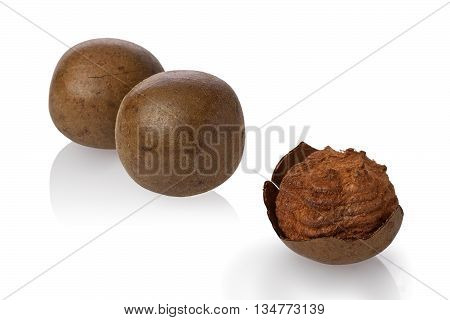 Composite of dried monk fruit or luo han guo against a white background.