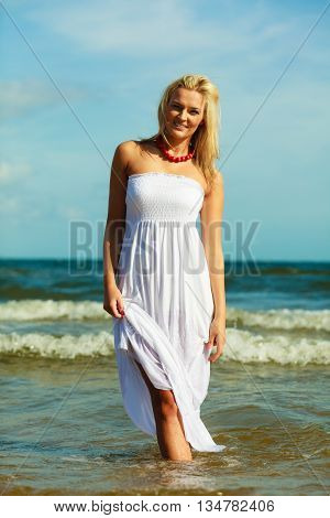 Young Woman Chilling Out On The Beach.