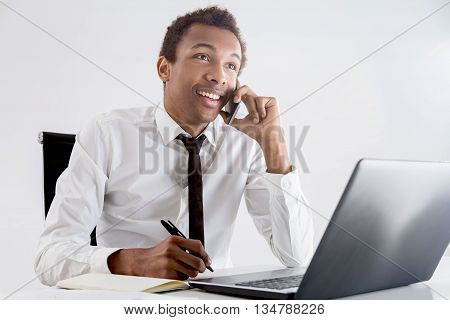 Cheerful Black Businessman On Phone