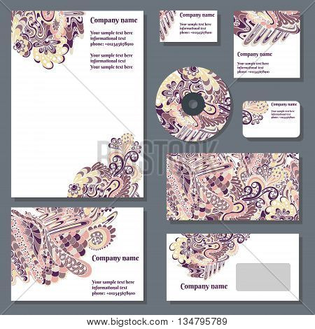 Set of templates for cd disks envelopes notebooks credit card business card and invitation card with doodle ornament. Corporate style vector.