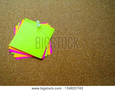Colorful post note on wood board with copy space