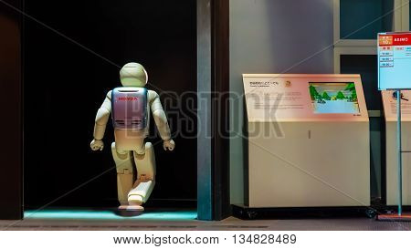 TOKYO JAPAN - NOVEMBER 27 2015: Asimo the humanoid robot created by Honda is presented at Miraikan The National Museum of Emerging Science and Innovation in Odaiba area