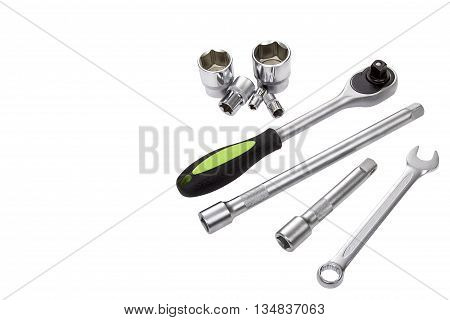 Wrench, ratchet handle, socket wrenches and extenders bar isolated