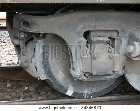 Industrial rail car wheels close up photo