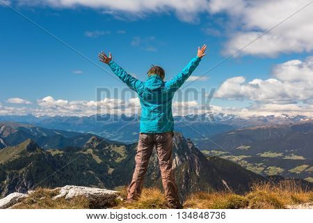 sport women on the top of mountain