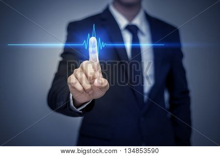 Businessman in suit working with digital virtual screen