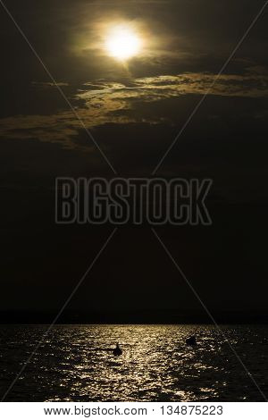 Sunset over Siutghiol lake during summer day