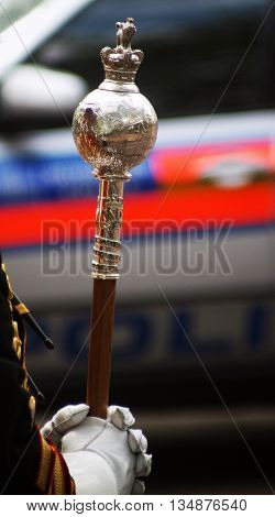 Royal Marines Drum Major with Police car in background