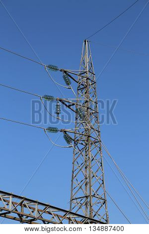 Iron Trellis With High-voltage Electrical Wires To Carry Electricity