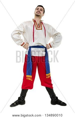 young man wearing a folk costume posing against isolated white background with copyspace