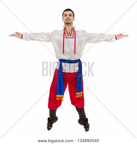 young man wearing a folk costume posing against isolated white background with copyspace