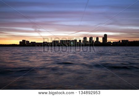 Moscow Strogino district in the evening at sunset. View from Strogino Bay