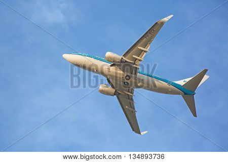 ZURICH - JULY 18: Boeing-737 KLM leaving Zurich after for short haul flight on July 18, 2015 in Zurich, Switzerland. Zurich airport is home for Swiss Air and one of biggest european hubs.