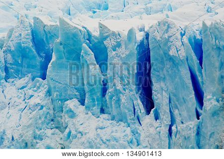 The blue ice of glacier Perito Moreno in Patagonia, Argentina