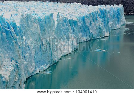 The blue ice of glacier Perito Moreno in Patagonia, Argentina