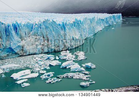 The blue ice of glacier Perito Moreno in Patagonia, Argentina