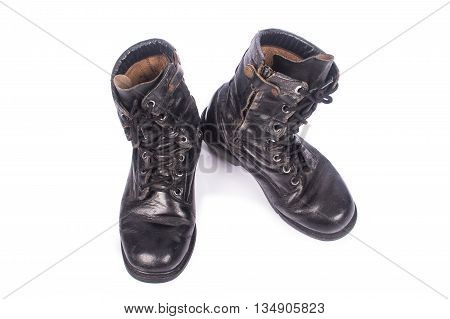 old black combat boots on white background