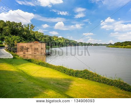 Raft house by the river in Kanchanaburi Thailand in a sunny day with clear blue sky in the background