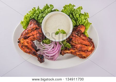 tandoori chicken leg, Tandoori Chicken , Indian spicy food, Delicious Tandoori chicken leg piece with Salad, India