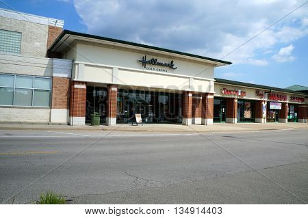 NAPERVILLE, ILLINOIS / UNITED STATES - JULY 23, 2015:  One may purchase greeting cards and small gifts at the Hallmark Gold Crown store, in a Naperville strip mall.