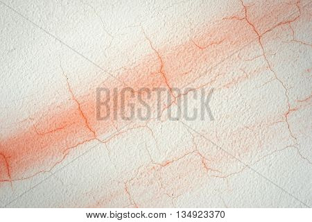 Cracked Painterd Red And White Concrete Wall With Diagonal Stripe