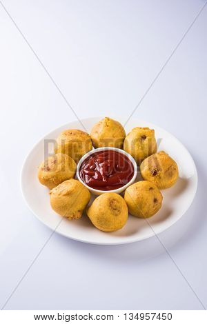 indian snacks also known as urad daal vada or indian pakoda or couth indian pakora or batata vada or aalu bonda or aalu bonde